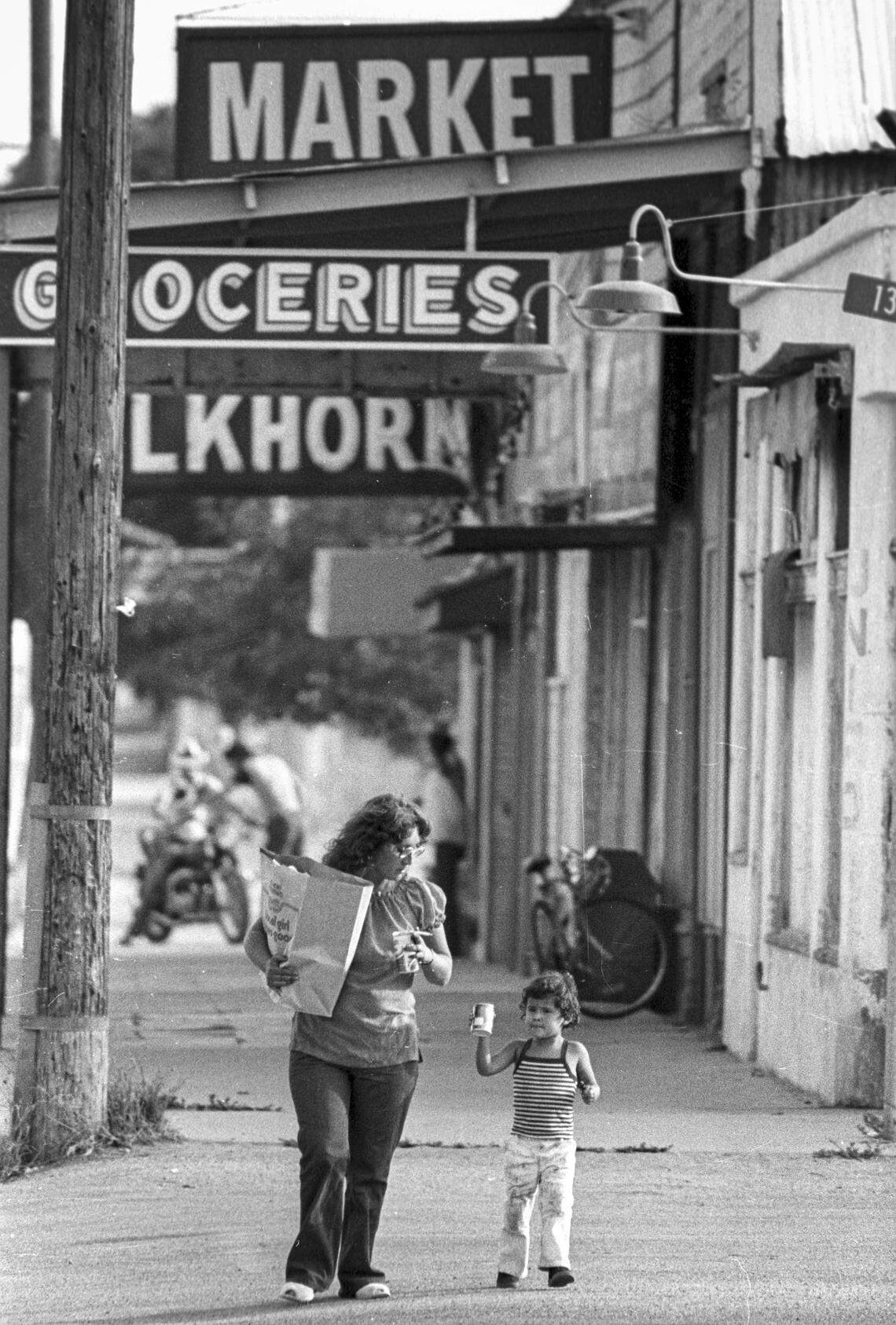 Lupe Gutierrez, whose niece was one of the two girls killed, caries her groceries home on Sept. 17, 1980. Teresa Lynn “Terry” Flores, 5, and Martha Jo Ann “Marty” Mezo, 4, disappeared shortly after 11 a.m. on May 17, 1980. The double murder is still unsolved.