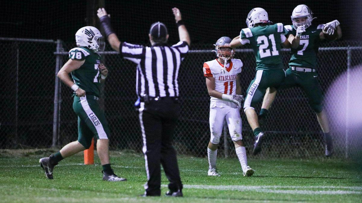 Te eagles celebrate a touchdown 78, Weston Patch , 21, Kolton Sobyra, 7, River Waltmire. Templeton lead for most of the game but at the end Atascadero came up with the win 20-16 Oct. 6, 2023.