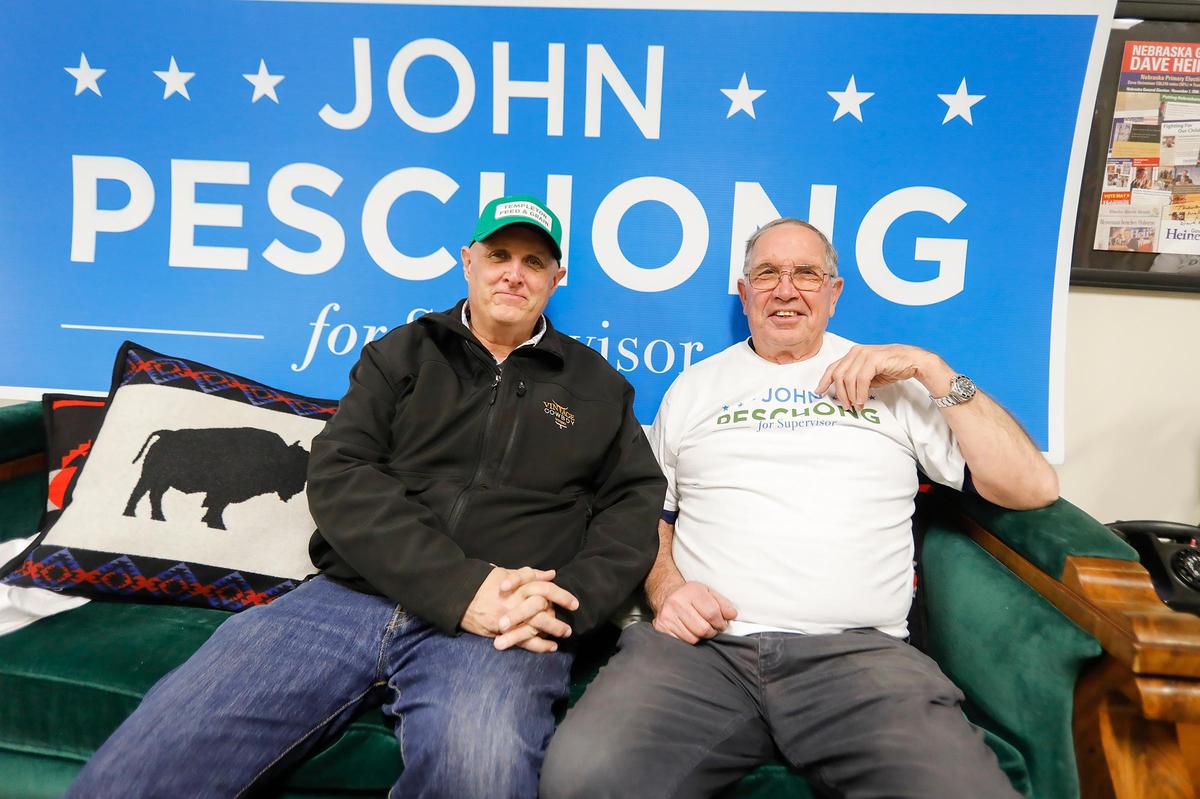SLO County Supervisor John Peschong is with Templeton with friends awaiting results of the District 1 supervisor race. He sits in front of his campaign sign with Tom Jermin of Atascadero.