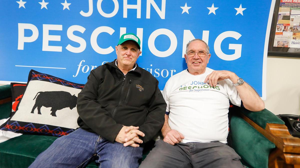 SLO County Supervisor John Peschong, left, awaits initial returns with Tom Jermin of Atascadero at an election night party in Templeton.