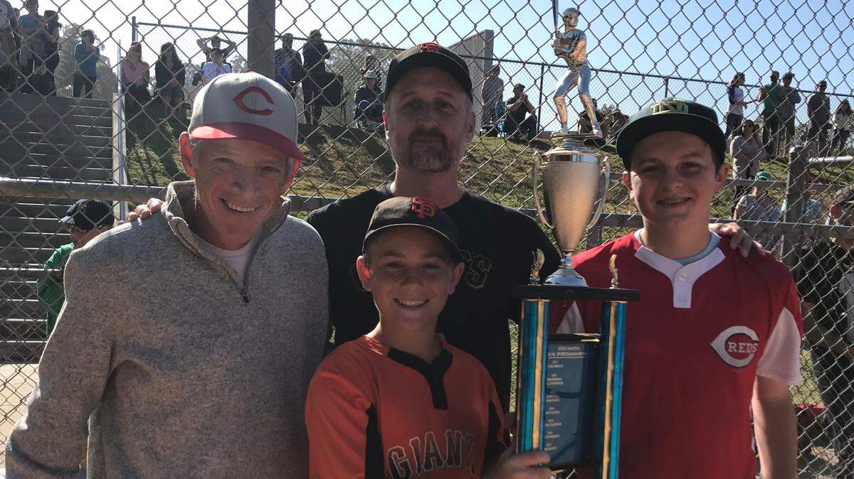 Thirteen year old Caiden Kennedy has won the Kniffen Award - given to the Cambria Little League player who shows sportsmanship, leadership, and a love of the game. Steve Kniffen (left), Caiden (holding award), coach Matt Saunders, and Aiden Kasper, last year's Kniffen Award winner.