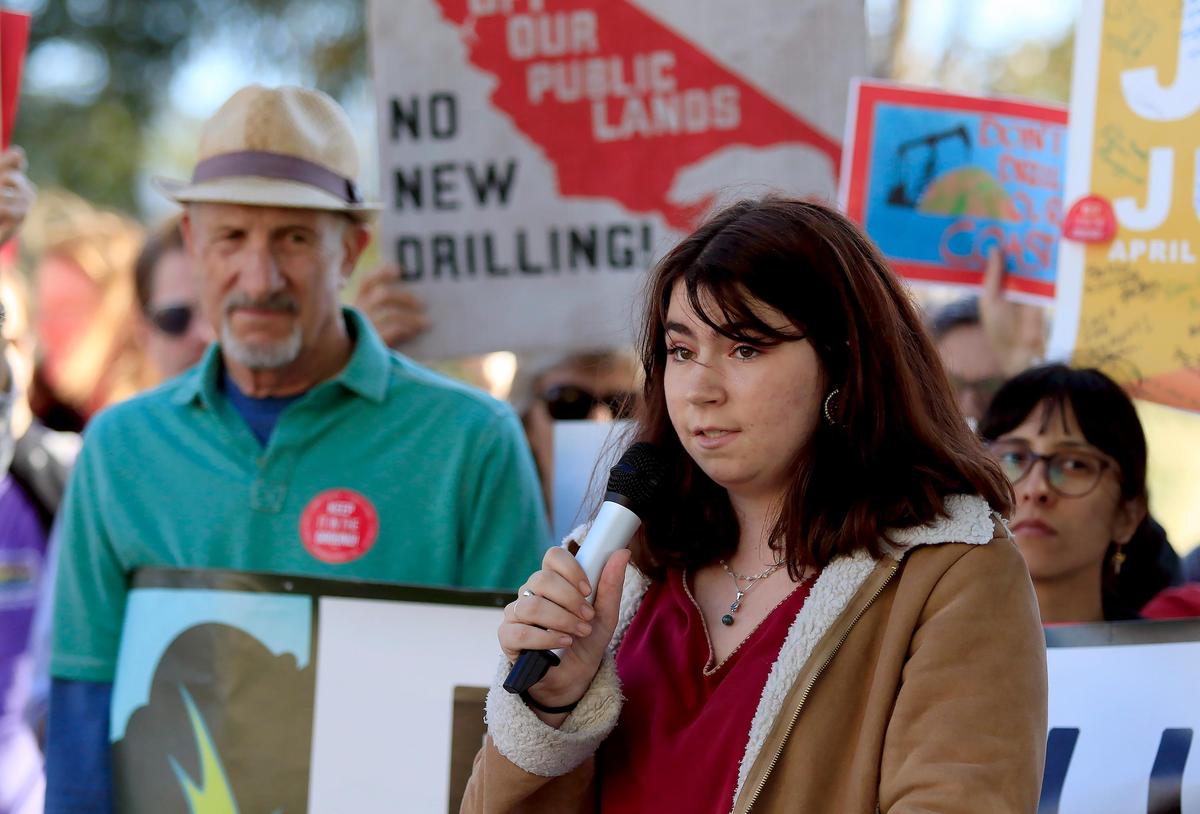 Carmen Bouquin of the SLO County Youth for Environmental Action speaks during a protest rally before Thursday night’s Bureau of Land Management meeting about a plan to reopen public land to new oil and gas leasing, including fracking.