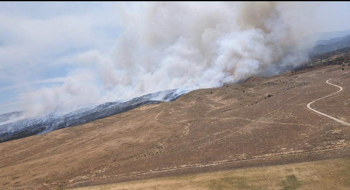 A fire burns southeast of New Cuyama and the intersection of Kirschenmenn Road and Foothill Road in Santa Barbara County on May 28, 2024. An evacuation warning was issued for nearby residents.