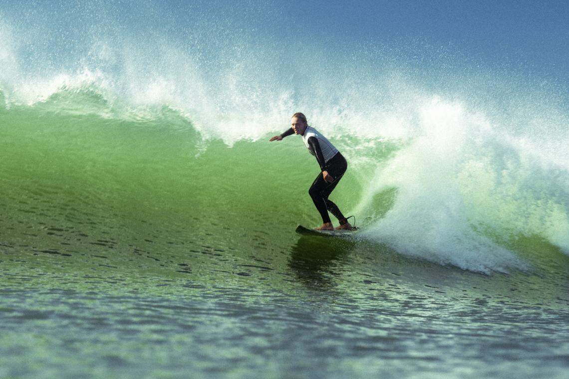 A surfer competes in the third annual Diva Cup Surf Invitational, San Luis Obispo County’s only woman’s surf competition, in Cayucos on Nov. 22, 2025.