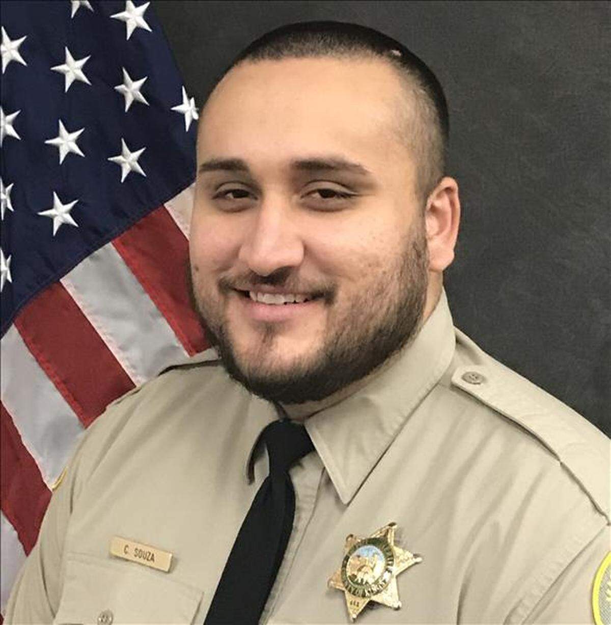 Kings County Sheriff’s Office Deputy Blake Bursiaga, a 7-year veteran of the department, was shot in the leg while trying to assist a fallen CHP officer during the manhunt for Mason Lira Thursday, June 11, 2020. The “C Souza” name tag he is wearing in this photo is not his.