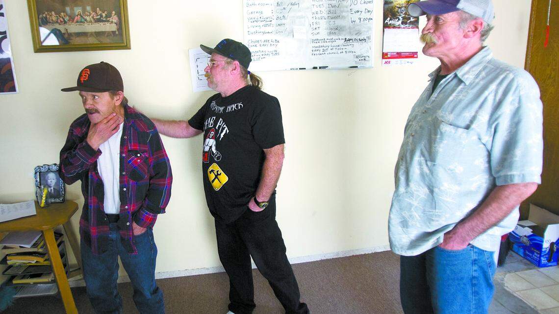 Ben Schaeffer, left, and Don Shea, right were living on the streets of San Luis Obispo three months ago and drinking. Now both are in a sober living facility managed by Russ McCormick, center.