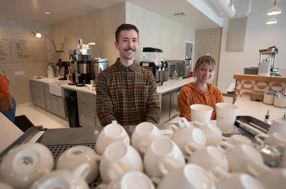 The new Scout Coffee location opened Tuesday, Feb. 21, 2024, in Morro Bay, following 18 months of converting the former Bank of America building. Barista Dan Hunstsman and trainer Kristy Durst assist customers at the bakery and coffee counter.
