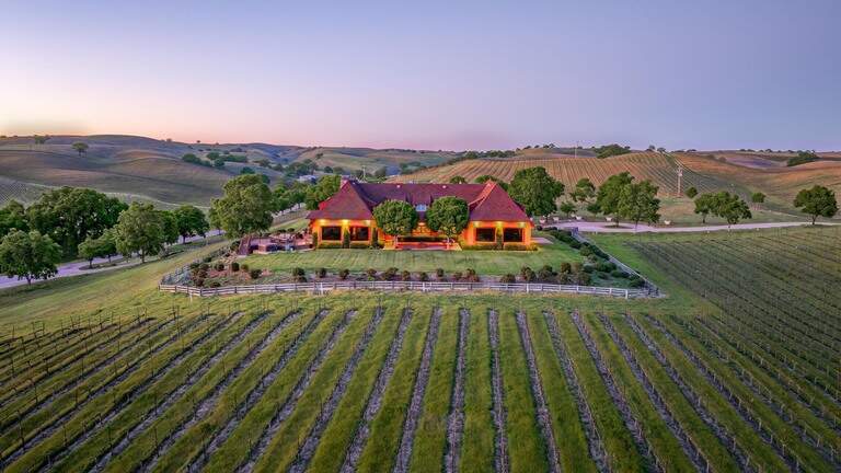 Alex Trebek’s former SLO County ranch sold at auction — for half its listing price