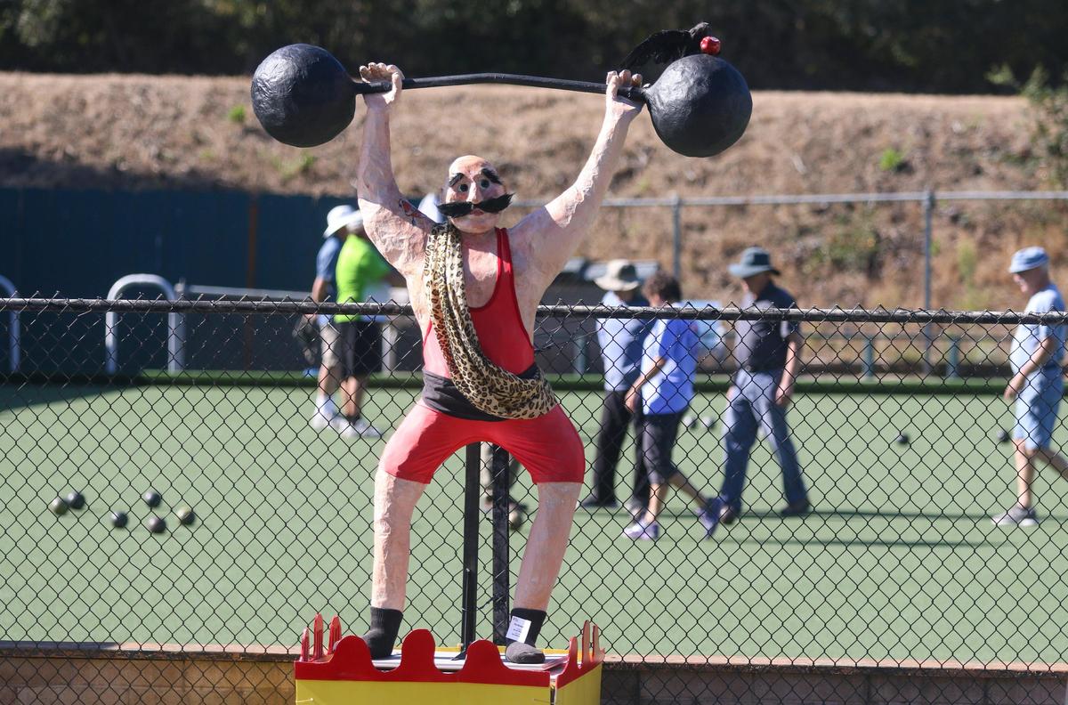 The Strong Man by Beverly Whitaker stands in front of the lawn bowling area as part of the 2019 Cambria Scarecrow Festival.