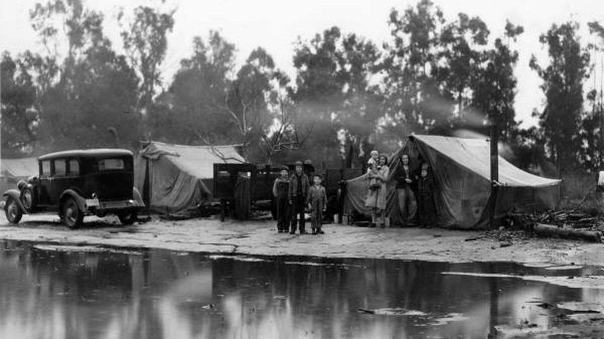 This 1937 photo by Dorthea Lange shows a rainy day at a migrant pea-picker's farm in Nipomo.