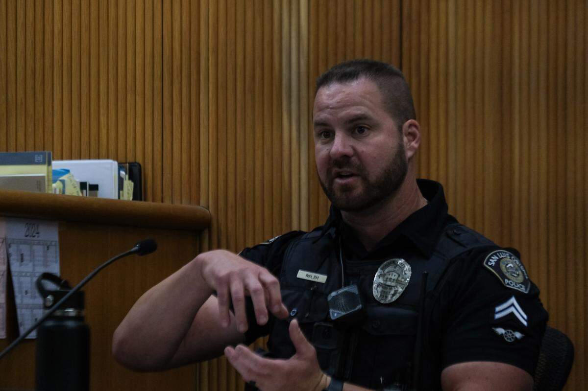 San Luis Obispo Police Officer Joshua Walsh testifies at the preliminary hearing against Daniel Saligan Patricio at San Luis Obispo Superior Court on Nov. 14, 2023. Saligan Patricio is charged with two counts of vehicular manslaughter for the killings of Jennifer Besser and Matthew Chachere on Nov. 21, 2022.