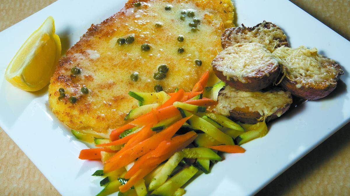 A recent seafood special: local Petrale sole with a panko crust and lemon, caper and butter sauce served with coleslaw and fries.