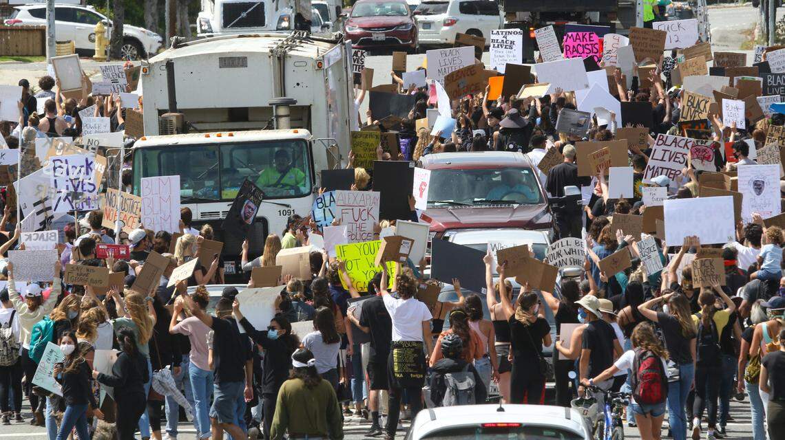 Traffic was stopped on Santa Rosa Street as marchers crossed the bridge over Highway 101 on June 1.