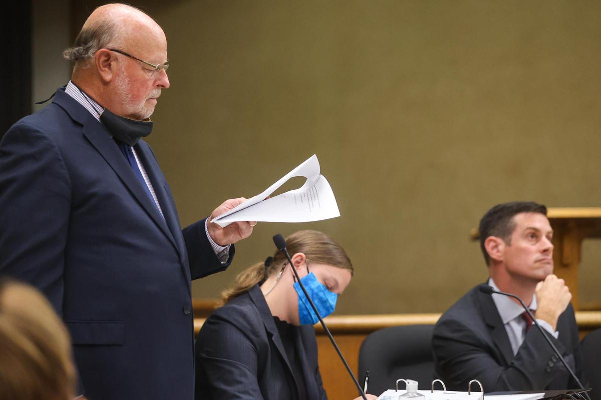 From left, defense attorney Robert Sanger reads back a statement to a witness on Tuesday, Aug. 2, 2021, during a preliminary hearing in San Luis Obispo Superior Court. He and Sara Sanger, center, both represent murder defendant Paul Flores. At right is San Luis Obispo County assistant district attorney Chris Peuvrelle.