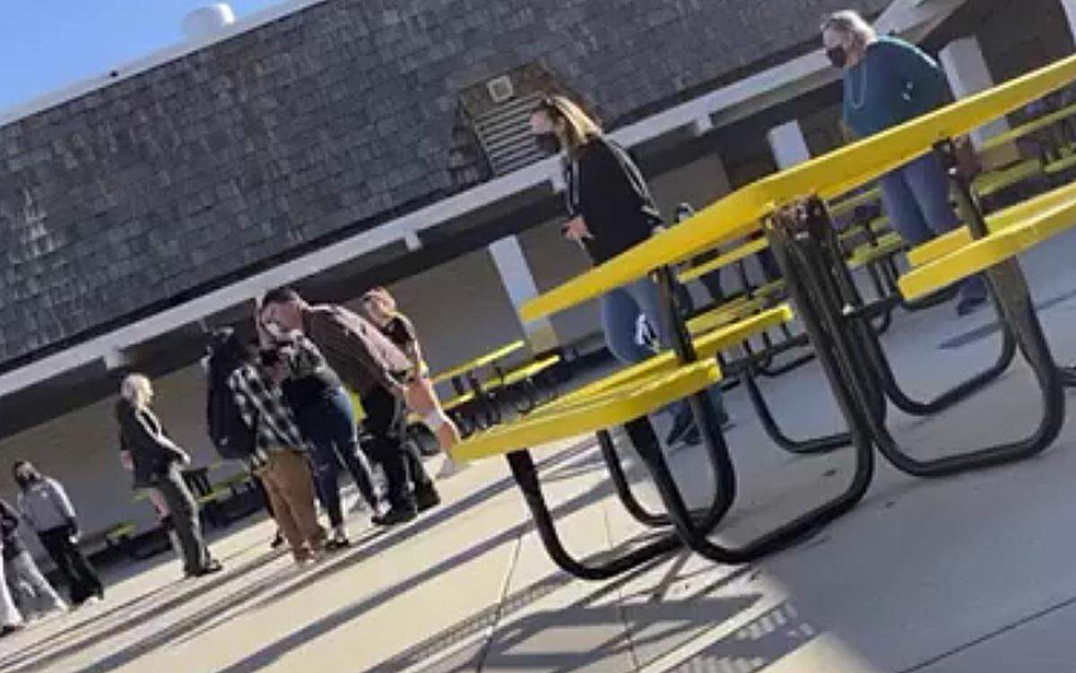 Morro Bay High School teacher David Kelley (in brown shirt and black pants) yells at a student during an altercation on Oct. 12, 2021, at Los Osos Middle School.