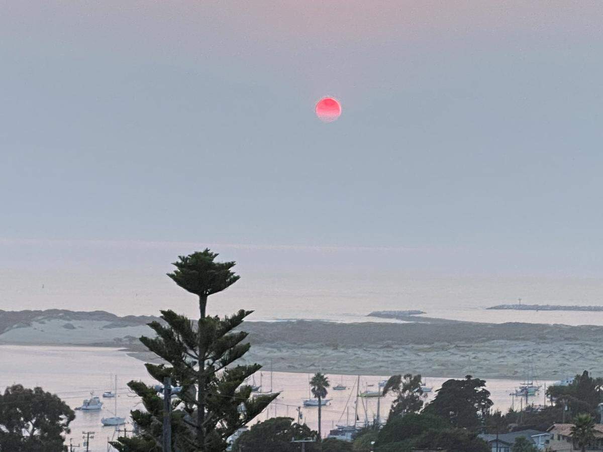 View of a Morro Bay sunset on evening of Tuesday, Aug. 18, 2020.