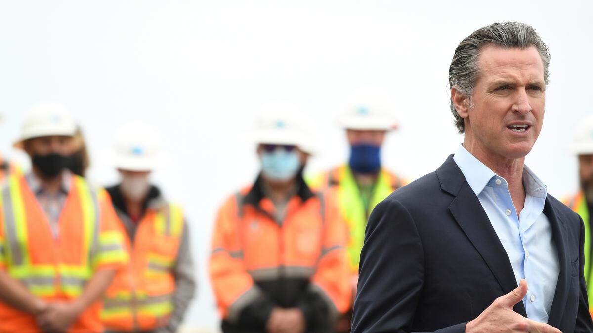 California Gov. Gavin Newsom speaks during a news conference about the newly reopened Highway 1 at Rat Creek near Big Sur on Friday, April 23, 2021. The union that represents state engineers was among the first organizations to make a significant financial contribution to a fund defending Newsom against a recall.