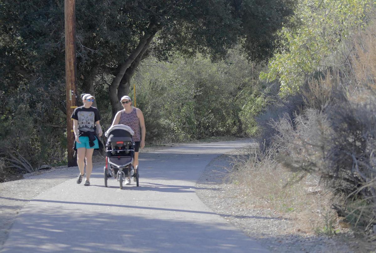 People walk on the Bob Jones Trail near Ontario Road on Oct. 29, 2024. San Luis Obispo County is trying to complete the path that would link San Luis Obispo to Avila Beach.