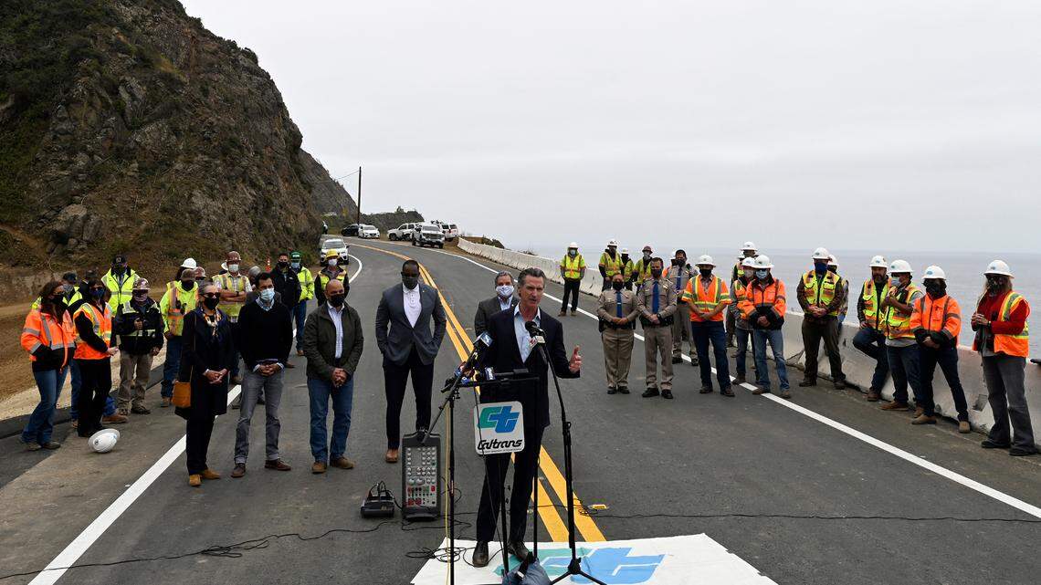 California Gov. Gavin Newsom speaks during a press conference about the newly reopened Highway 1 at Rat Creek near Big Sur, Calif., Friday, April 23, 2021. State agencies are hiring hundreds of transportation workers. (AP Photo/Nic Coury)