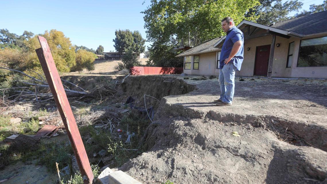 Aaron Spiller lost most of his Atascadero backyard and his house was red-tagged as uninhabitable by the City of Atascadero after storm debris rerouted the flow of Graves Creek into his yard during the March 2023 storms. See here on Oct. 18, 2023.