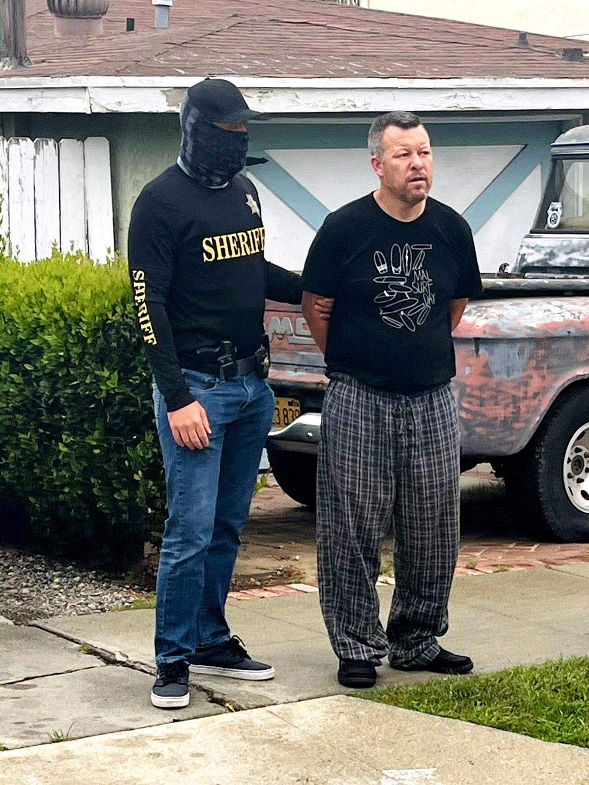 Paul Flores, 44, of San Pedro is arrested Tuesday, April 13, 2021, on suspicion of murder in connection with the disappearance of missing Cal Poly student Kristin Smart.