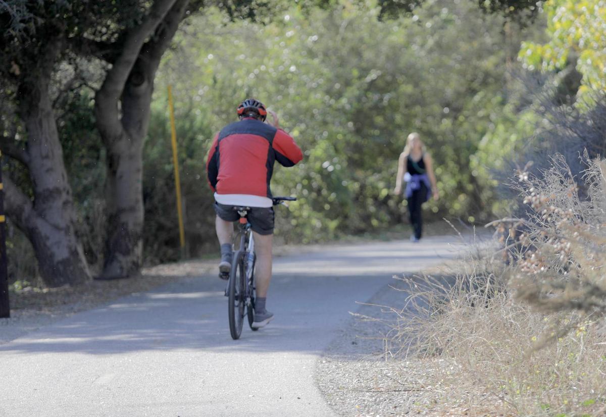 People ride bikes and walk on the Bob Jones Trail near Ontario Road on Oct. 29, 2024. San Luis Obispo County is trying to complete the path that would link San Luis Obispo to Avila Beach.