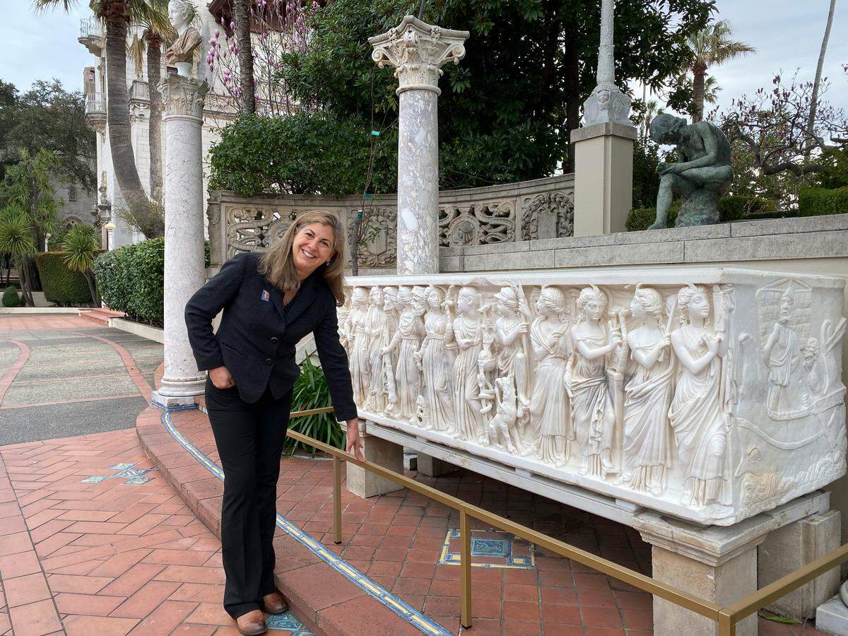 Cara O’Brien, who was recently promoted to Hearst Castle museum director, highlights an enormous ancient Roman sarcophagus that’s one of 20,000 artifacts, artworks and treasures in the collection at the former estate of media magnate/art collector William Randolph Hearst.
