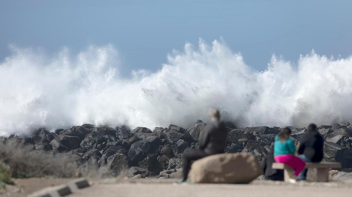Large waves crash at the Morro Bay Harbor breakwater near Morro Rock on Monday, Feb. 19, 2024, after a storm slammed San Luis Obispo County on Sunday night, bringing with it rising creeks and rivers and at least one swift water rescue.