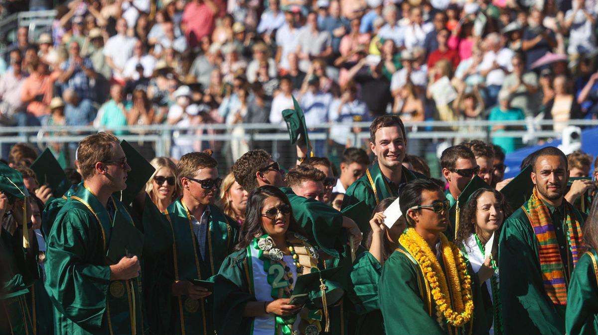 Thousands of family and friends fill Spanos Stadium to honor Cal Poly's Class of 2022 at commencement last year. The city expects 50,000 visitors in town for this year's festivities. 