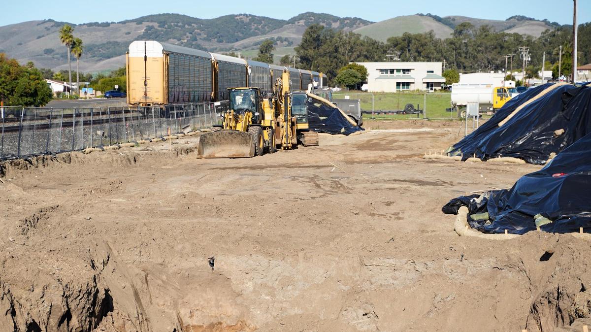 Construction work on a new mixed-use condominium and commercial space development at the former site of B.J.’s ATV Rentals at 197 West Grand Ave. in Grover Beach unearthed an oily substance that residents nearby could smell, pictured Tuesday, Dec. 31, 2024. Grover Beach community development director Megan Martin said the contaminated soil was expected in the building process, and will be removed by Friday, Jan. 10, 2025.
