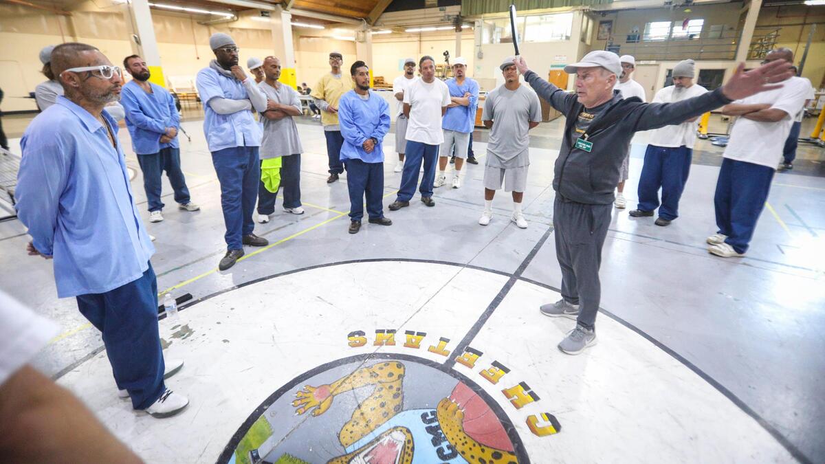 Pickleball coach Roger BelAir visited the California Men’s Colony in San Luis Obispo on Nov. 12, 2024, to teach the game to inmates. Hollywood filmmaker Daniel Ostroff was producing the documentary “Pickleball in Prison,” and a film crew was recording how the sport can break down barriers and provide positive interactions between inmates and staff.