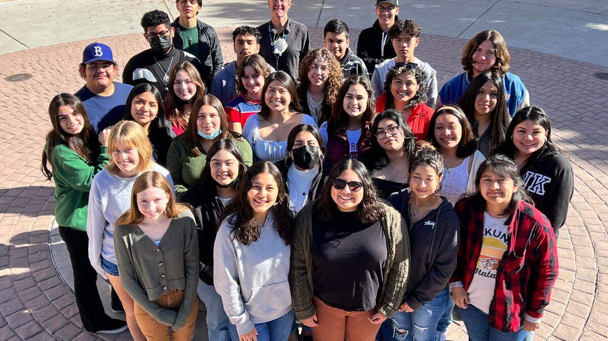 Retired Paso Robles High teacher Geoffrey Land is seen here with students from his ethnic studies class in 2022.  