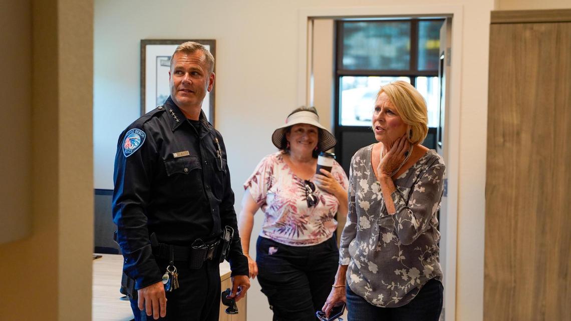 Pismo Beach Police Chief Jeff Smith leads City Council member Marcia Guthrie on a tour of the new Pismo Beach Police & Parking Annex on Monday, Oct. 14, 2024. The $1.5 million facility was home to Pismo Beach City Hall and a tourism office over its nine decades of history.