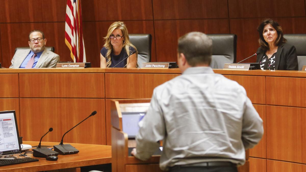 The San Luis Obispo County Board of Supervisors has agreed to rotate the chairmanship next year, a sign of improving relationships. From left, Adam Hill, Lynn Compton and Debbie Arnold listen to a speaker during public comment.