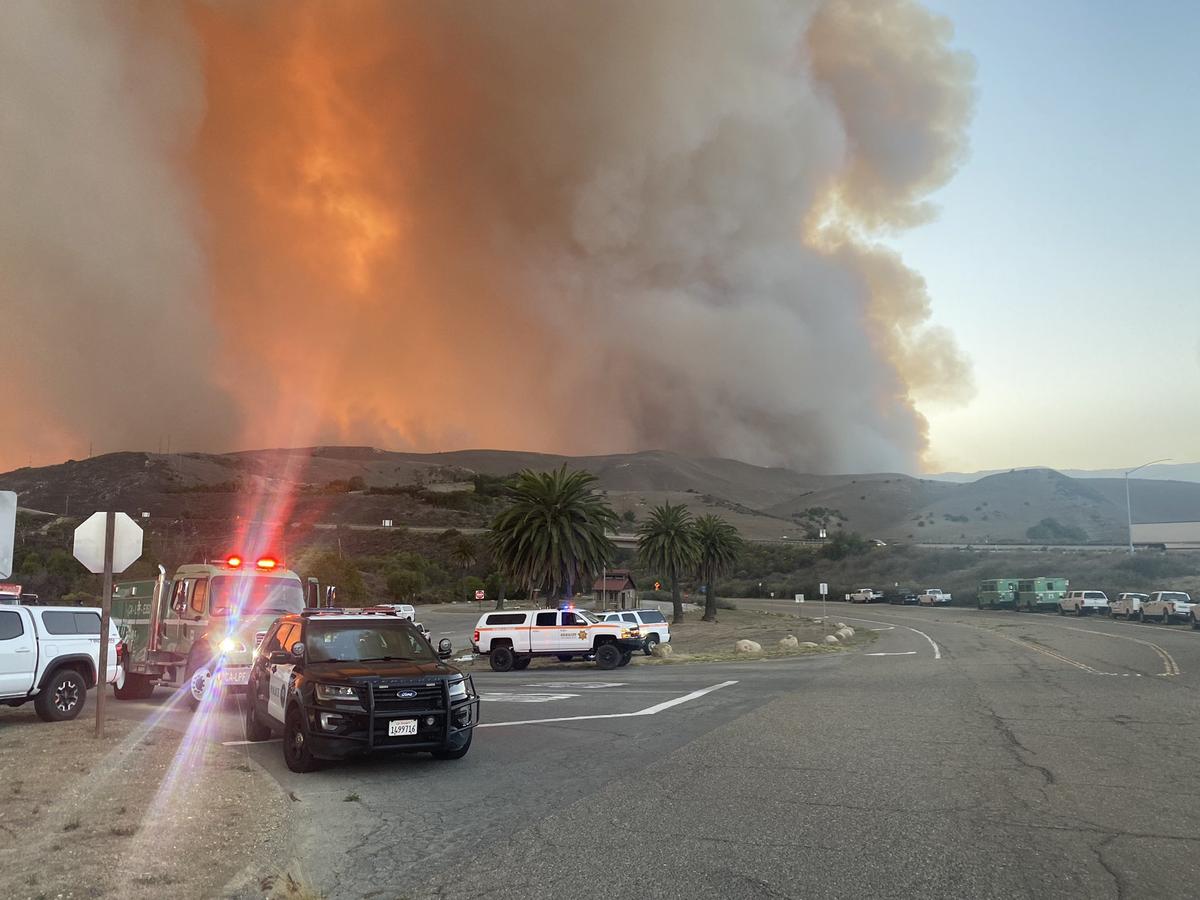 A column of smoke rises from the Alisal Fire on Monday evening. As of Tuesday morning it has grown to 6,000 acres, fire officials say. Highway 101 was closed in both directions north of Santa Barbara due to the fire.
