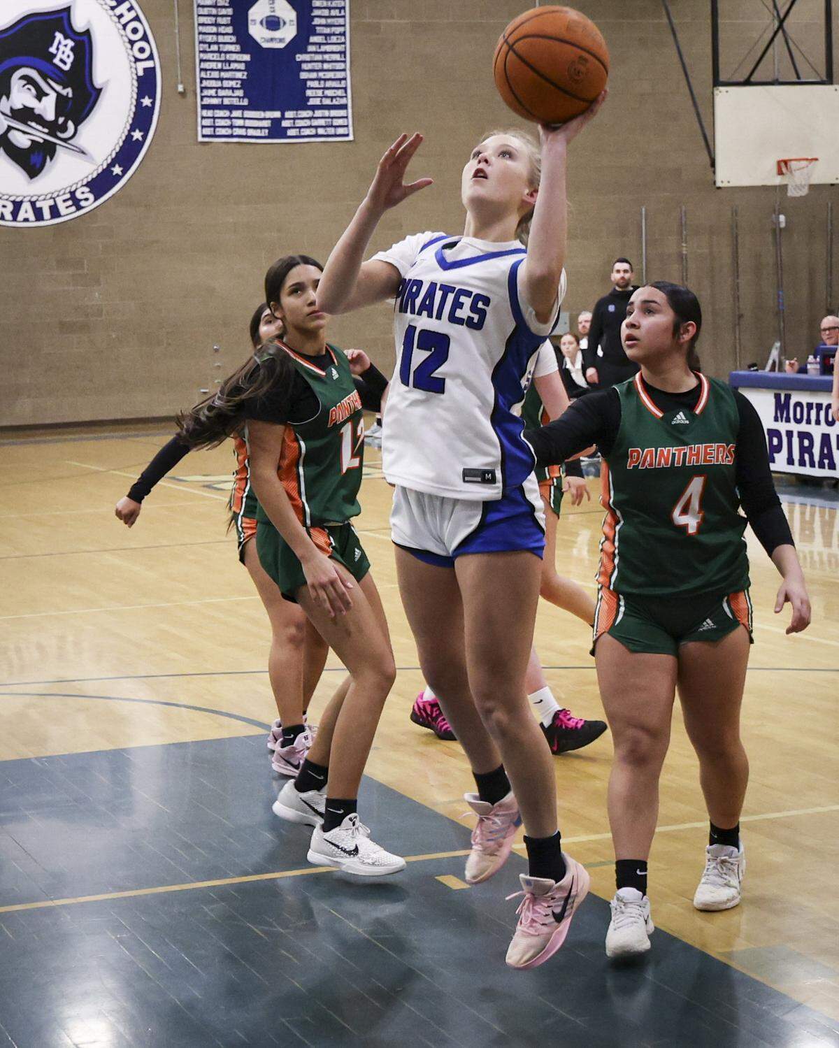 Josie Smith shoots. Morro Bay beat Porterville 37-25 to advance to the semi-final game in the Division III CIF Central Section Girls Basketball Championships.