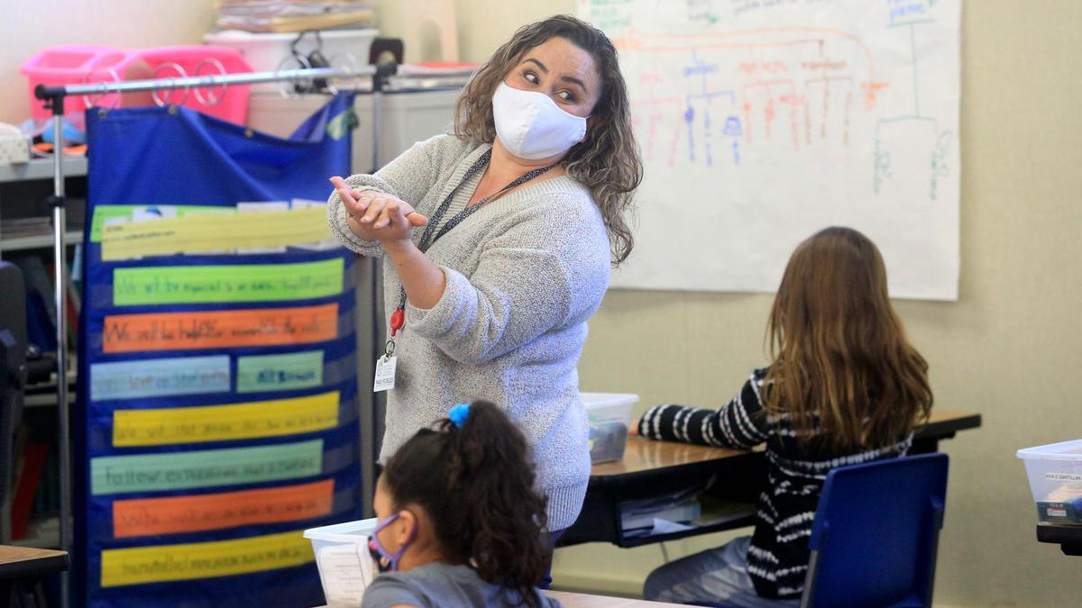 Christiana Velasco leads her third grade class in a science lesson about bees and pollination at Georgia Brown Elementary School in Paso Robles.