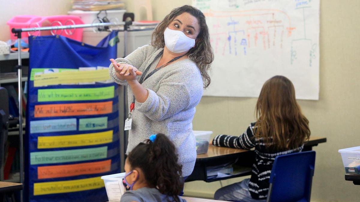 Public schools around San Luis Obispo County are gradually reopening for in-person classes. Here, teacher Christiana Velasco leads her third-grade class in a science lesson at Georgia Brown Elementary School in Paso Robles.