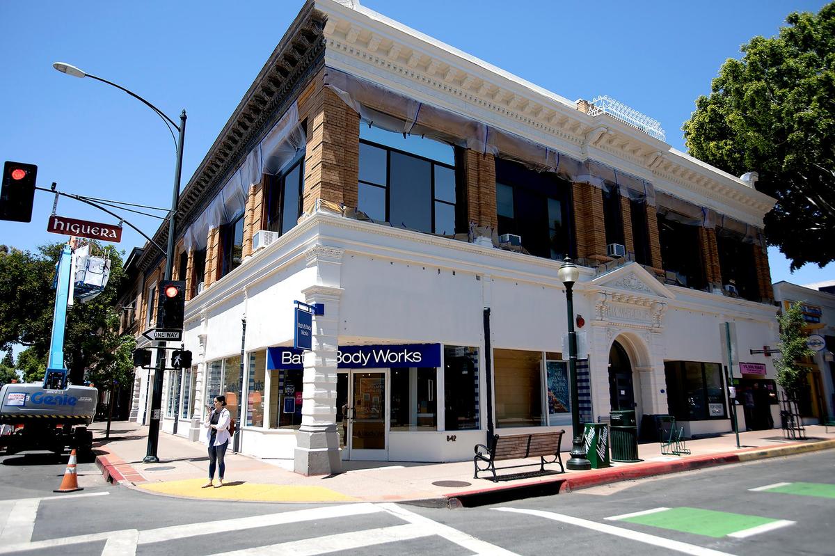 The historical H.M. Warden Jr. or Tower Building downtown is being painted white, much to the concern for some residents.