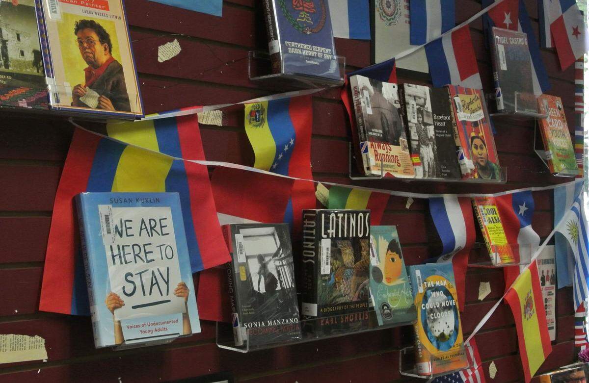 A display at Paso Robles High School honors Hispanic Heritage Month with books by Latino authors and featuring Latino characters.