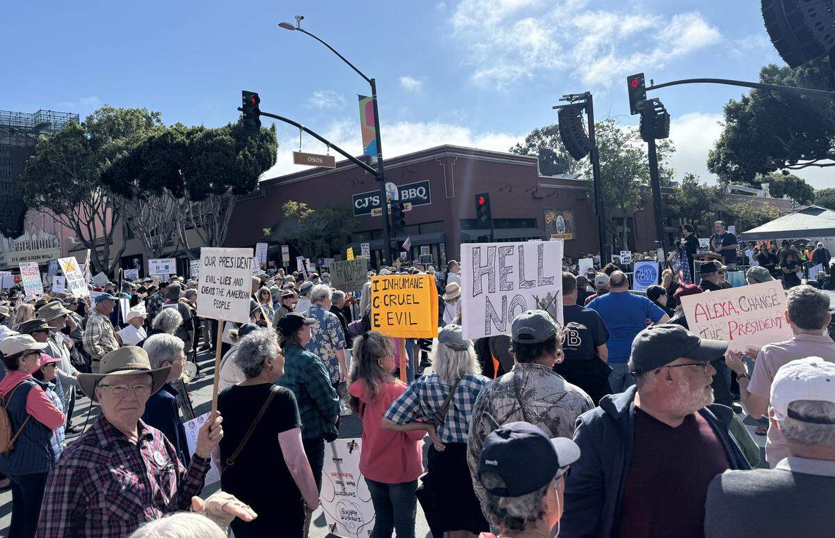 Residents across SLO County rallied downtown at the San Luis Obispo Superior Courthouse for a No Kings protest featuring speakers, music and community groups on March 28, 2026.