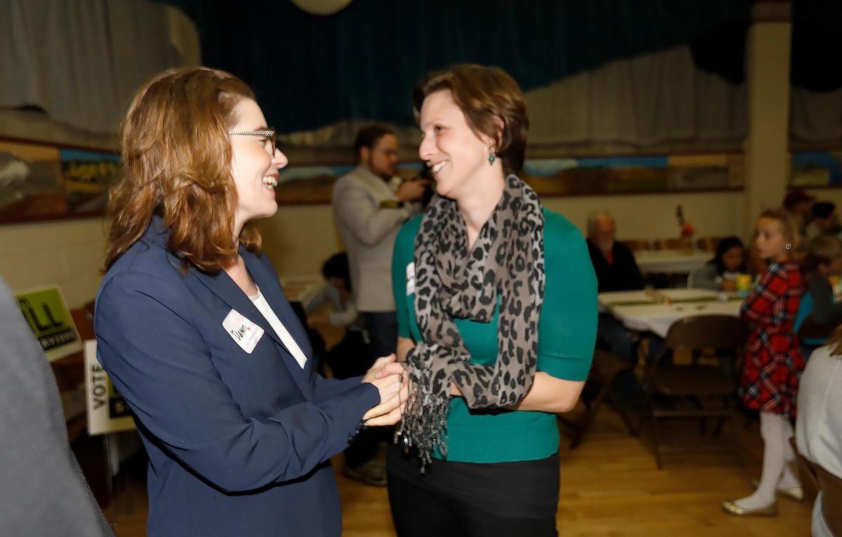 Dawn Addis, left, shakes hands with supporter Amanda Tompkins at the Guild Hall in San Luis Obispo, where she announced her Assembly candidacy on Thursday. She will challenge incumbent Jordan Cunningham.