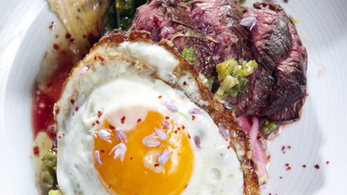 The Niman Ranch hanger steak at Foremost Wine Co. in San Luis Obispo comes with miso butter, asparagus and a fried egg.
