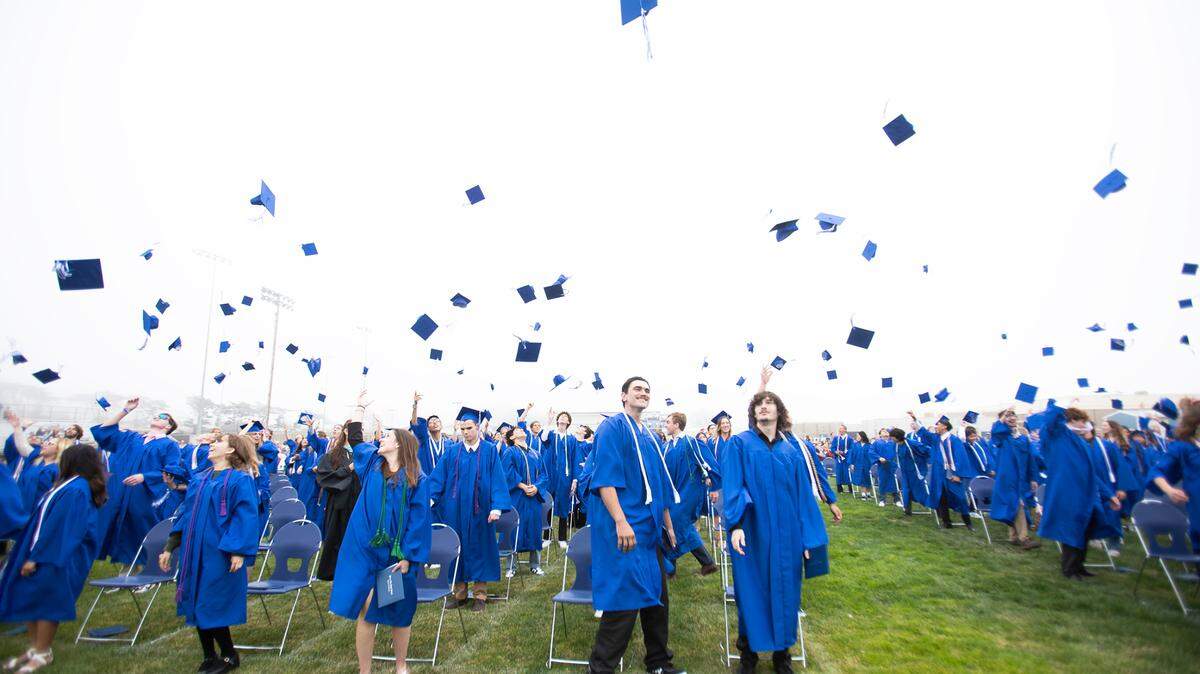 Morro Bay High School celebrated the accomplishments of its graduating Class of 2024 during a commencement ceremony on June 6, 2024. Student graduates flip their hats in the air.