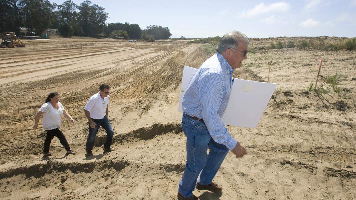 From left, Karen Borges, Russ Lovell and Paul Ready tour the site of the Jack Ready Imagination Park in Nipomo.