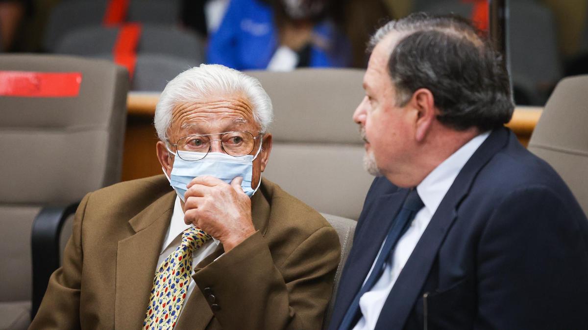 Ruben Flores, left, talks with his attorney, Harold Mesick, before a court hearing resumes on July 14, 2021. Ruben Flores, father of Paul, is charged as an accessory to murder in the Kristin Smart case.