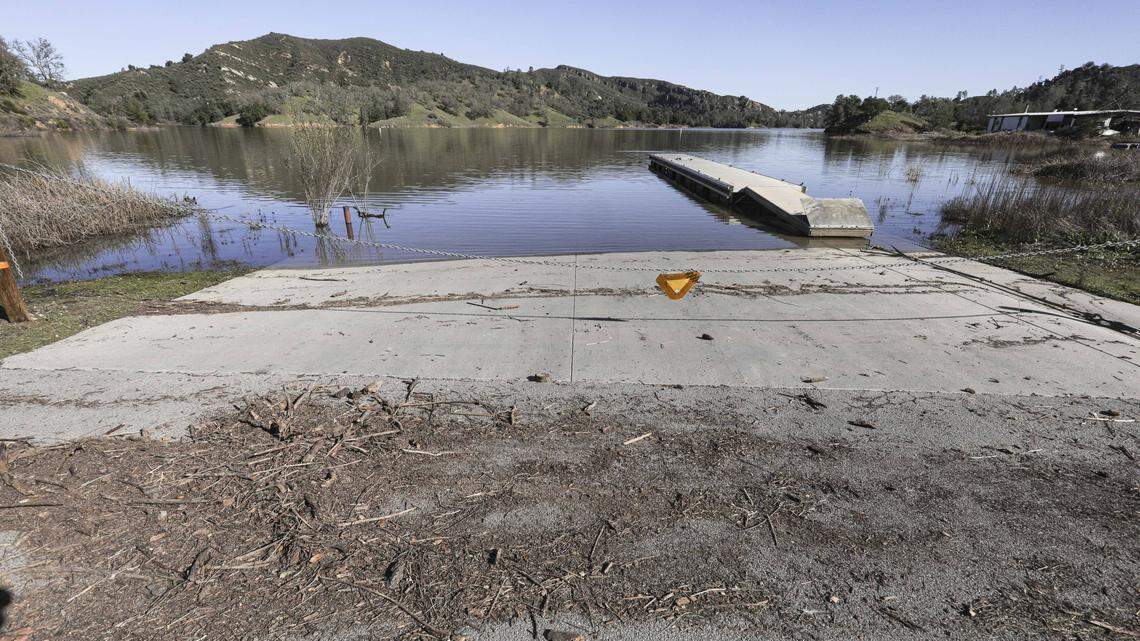 The main boat launch ramp shows debris from the high water mark. The Salinas Dam on Santa Margarita Lake was at almost 102% capacity on Jan. 9, 2026.