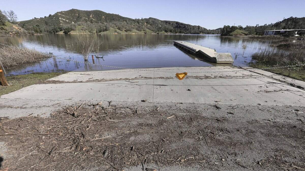 The main boat launch ramp shows debris from the high water mark. The Salinas Dam on Santa Margarita Lake was at almost 102% capacity on Jan. 9, 2026.