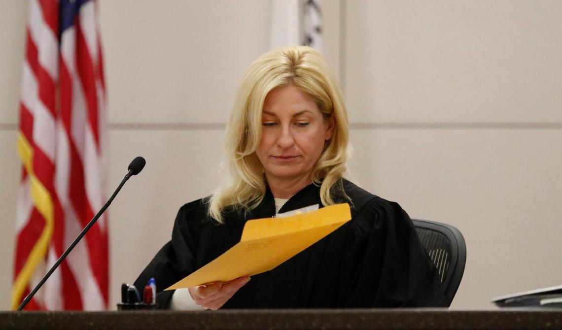 Monterey County Superior Court Judge Jennifer J. O’Keefe reads the verdict envelope for Ruben Flores. The jury acquitted Ruben Flores of helping his son, Paul Flores, cover up the murder of Cal Poly student Kristin Smart. The jury’s verdict was read in Monterey County Superior Court on Tuesday, Oct. 18, 2022.