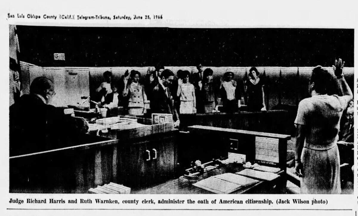 Judge Richard Harris and Ruth Warnken, county clerk, administer the oath of American Citizenship, published June 25, 1966.